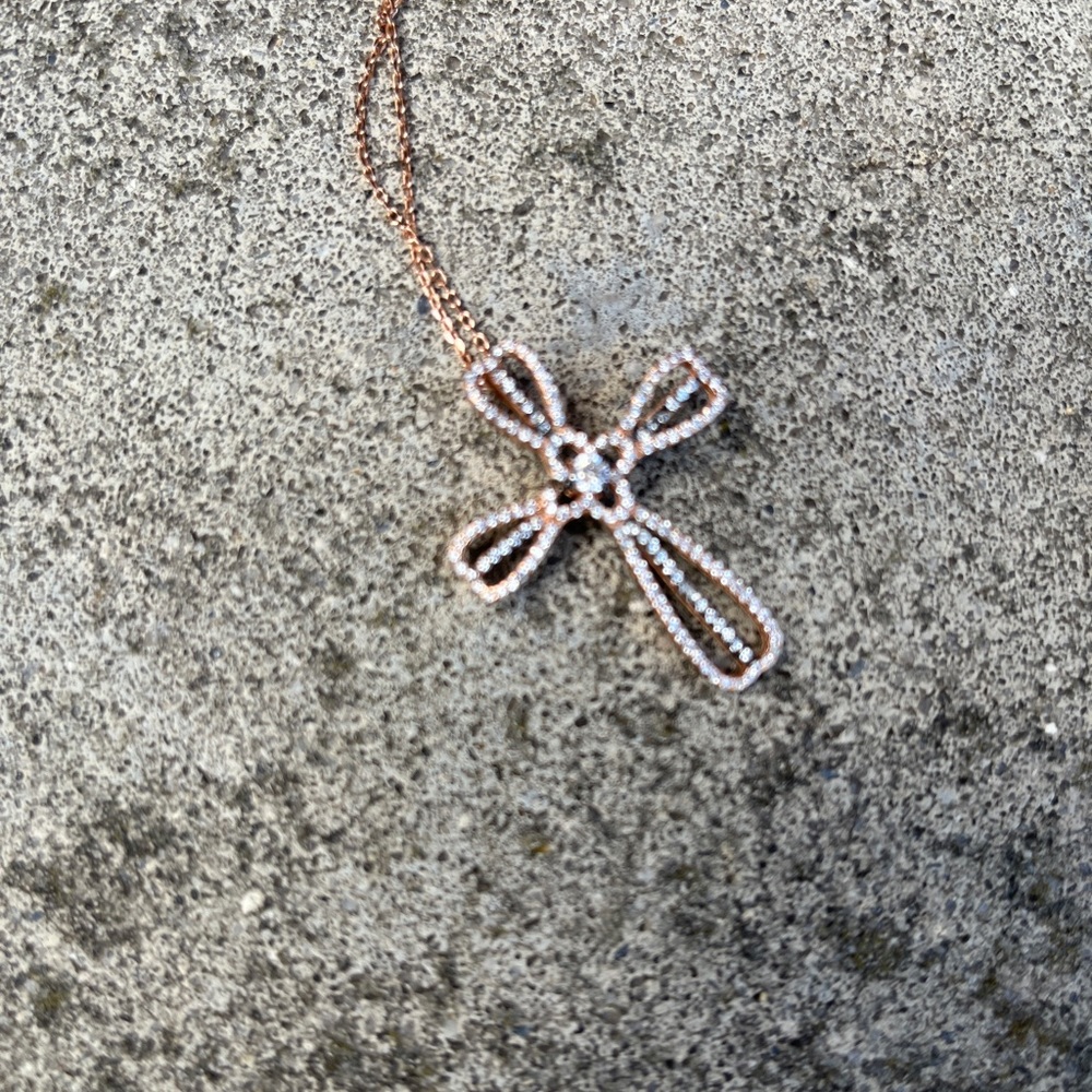 Bella Luce rose gold cross necklace. Adjustable length 16-18 inches pave set